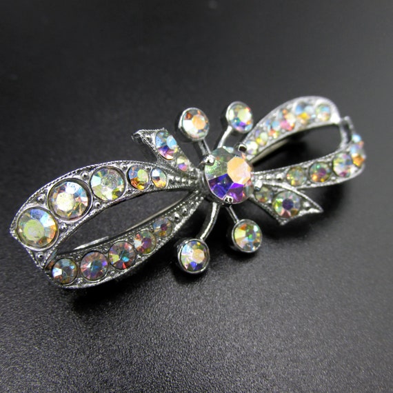 Vintage knot brooch in chrome metal and rainbow-c… - image 5
