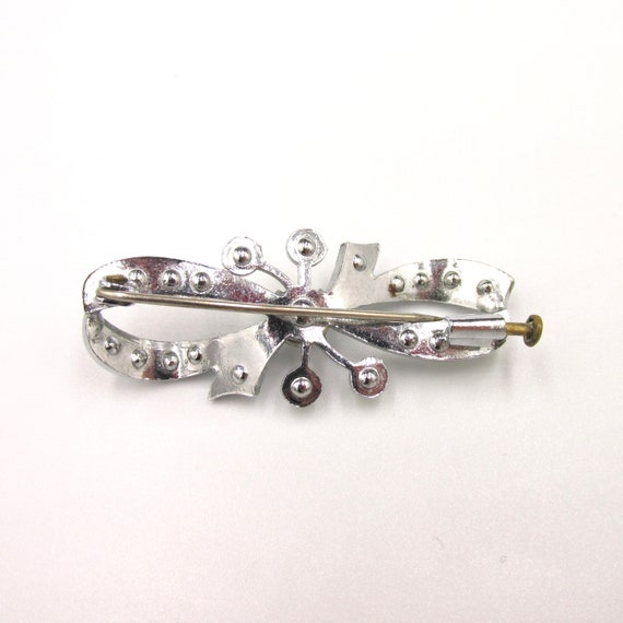 Vintage knot brooch in chrome metal and rainbow-c… - image 9