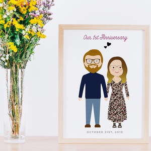 May include: A framed illustration of a couple with the text "Our 1st Anniversary" and "OCTOBER 31ST, 2019" below the illustration.