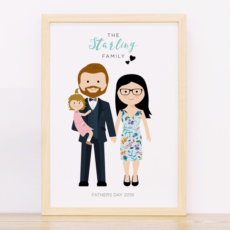May include: A framed illustration of a family with a father holding a young girl, a mother standing next to him, and the text "The Starling Family" above them. The text "Fathers Day 2019" is below the family.