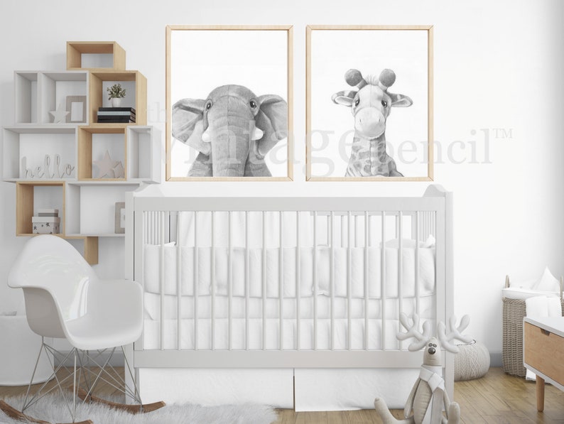 May include: A white crib with a white rocking chair and a white shelf unit with a gray elephant and giraffe print on the wall.