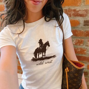 wild west baby tee | cowgirl, cowgirl baby tee, aesthetic, western, horses, cute baby tee, 90s baby tee, gifts for her, cute tshirt