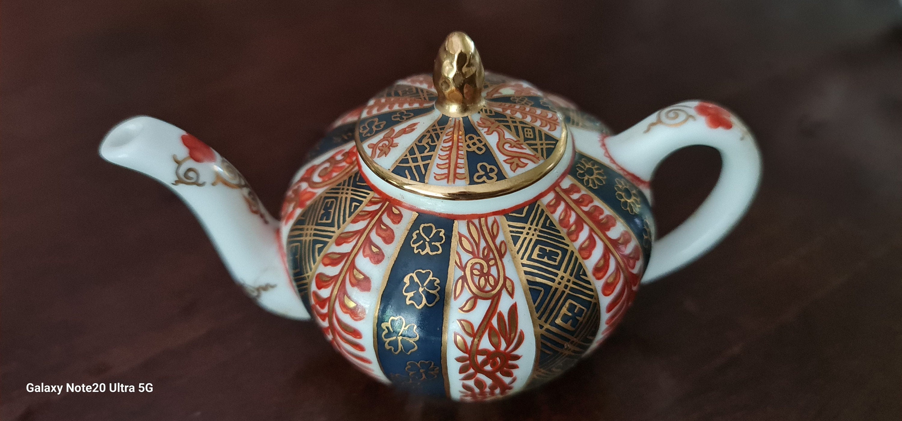 Franklin Mint Collectible Set of 10 Teapots - Hand Painted for the