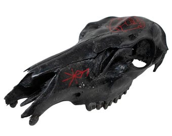 blackened elk skull loki snaptun stone altar piece