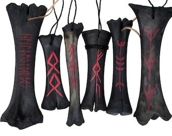 blackened ritual leg bone talismans