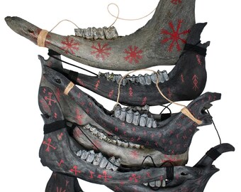 blackened elk and cow jawbone talismans