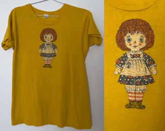 70s Mayo Spruce Raggedy Ann Tee Size S-M | Vintage 1970s Yellow Graphic T Shirt