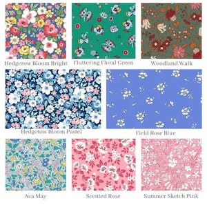 May include: A collection of fabric swatches featuring floral patterns in various colors, including blue, green, pink, and white. The swatches are labeled with names like "Hedgetow Bloom Pastel", "Field Rose Blue", and "Summer Sketch Pink".