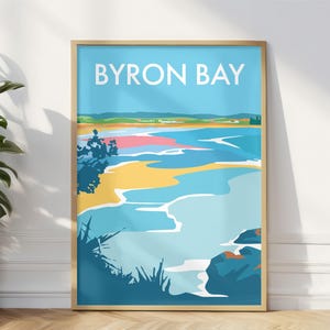 May include: A colorful illustration of a beach scene with the text "BYRON BAY" at the top. The image features a blue sky, green hills, a sandy beach, and blue water with white waves.