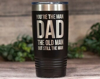 May include: Black stainless steel tumbler with a silver inscription that reads "You're the man Dad The old man but still the man".
