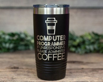 May include: Black stainless steel tumbler with a white inscription that reads "Computer Programmer If Unresponsive Please Administer Coffee". A coffee cup icon is above the text.