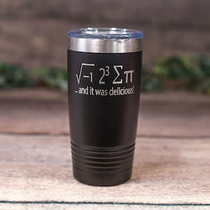 May include: Black stainless steel tumbler with a white inscription that reads "√-1 2³ Σπ ... and it was delicious!"