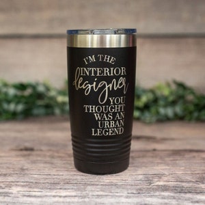 May include: Black stainless steel tumbler with a gold inscription that reads "I'm the interior designer you thought was an urban legend."