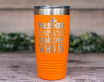 May include: Orange stainless steel tumbler with a silver cross and the text "Pastor Not a miracle worker but I can lead you to someone who is".
