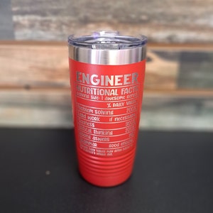 May include: Red stainless steel tumbler with a white inscription that reads "Engineer Nutritional Facts Serving Size: 1 awesome gene % Daily Value Problem Solving 200% Hard Work if necessary 300% Sexiness 200% Critical Thinking 200% Wrong Answers good enough Grammar"
