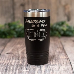 May include: Black stainless steel tumbler with a white engraved design that says "Anatomy of a Pew" with a diagram of a bullet and the words "Bang Button", "Magical Fire Dust", "Metal Holdy Thing", and "Freedom Seed".