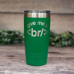 May include: Green stainless steel tumbler with a silver lid and the text "give me a <br/>" engraved on the side.