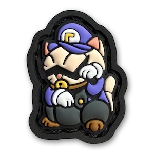 May include: A purple and black cartoon cat wearing a purple hat with a gold letter 'L' on it. The cat is sitting with its paws crossed and has a white mustache.