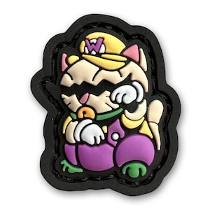 May include: A black and white cartoon cat wearing a yellow hat with a "W" on it. The cat is wearing a purple jumpsuit and has a green collar. The cat is sitting on a green and purple flower.