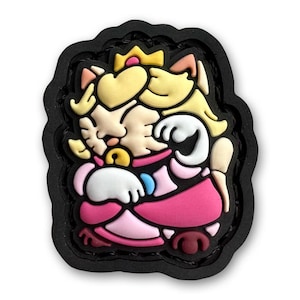 May include: A pink and white cartoon character with a yellow crown and blonde hair. The character is wearing a pink dress and has a blue and white collar. The character is in a sleeping pose with its eyes closed. The character is on a black background.