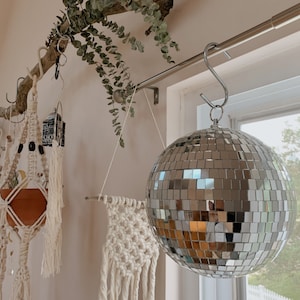 8 Inch Disco Ball with Circle Ring - Add Sparkle and Shine to Your Party or Event with a Magical Disco Light - Available Now!