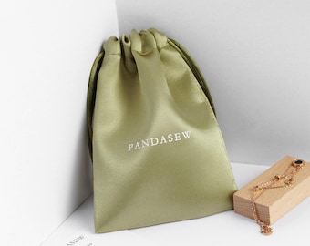 100pcs logo print custom drawstring bag, satin dust bags, thin silk package pouches, clothing & shoe bags hair packaging bags green gift bag