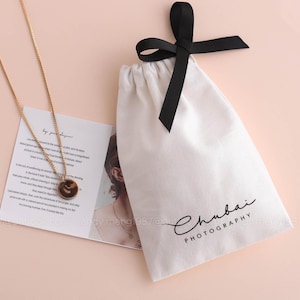 50pcs custom jewelry packaging pouch Cotton canvas bags personalized logo with ribbon bag chic small pouch jewellery packaging PandaSew White &single ribbon