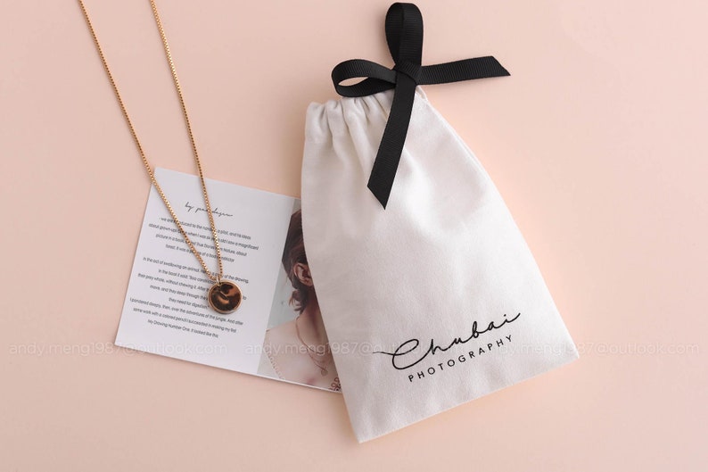 8 oz white cotton canvas pouch with single sided ribbon bow tie drawstring