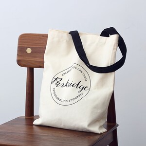 floral tote bag beige color with black ribbon handles