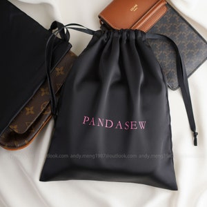 luxury dense thick satin bag in black color with nice pink printing logo, smooth satin drawstring