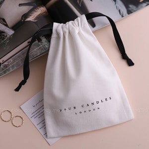 50pcs custom jewelry packaging pouch Cotton canvas bags personalized logo with ribbon bag chic small pouch jewellery packaging PandaSew White