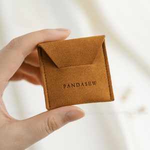 tiny little buckle pouch in brown shade