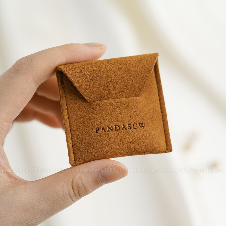 tiny little buckle pouch in brown shade