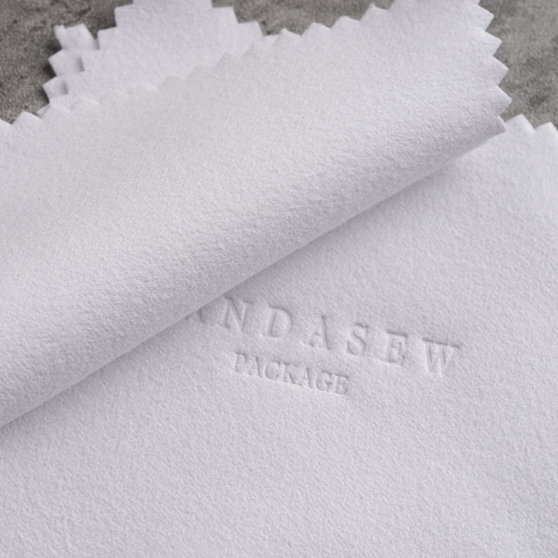 cleaning cloth with debossed logo