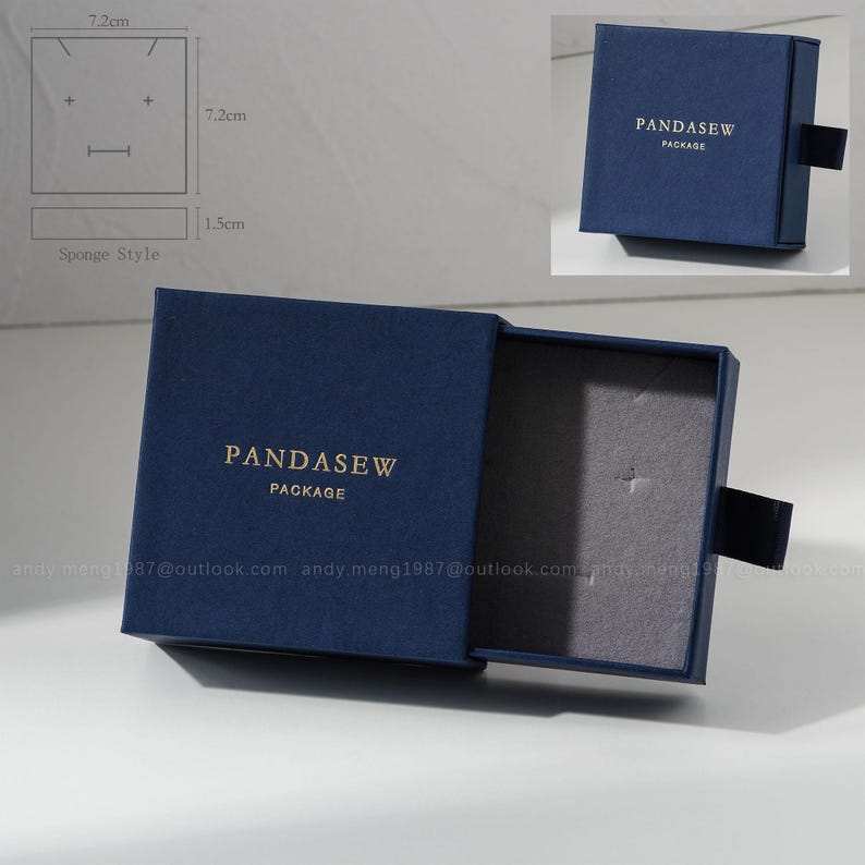 navy blue paper box with foam inside
