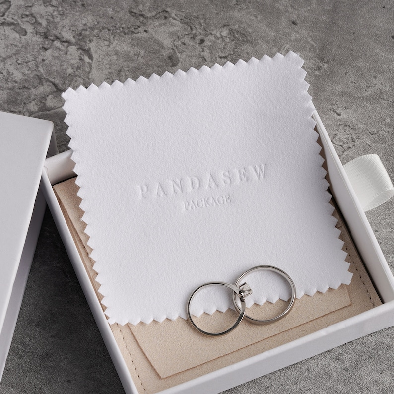 white cleaning cloth with logo, pandasew package