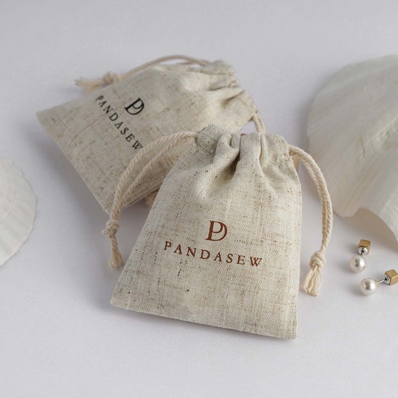 Fabric Drawstring Gift Bag Suede Drawstring Gift Packaging Pouch Small  White Bag with Custom Gold Logo Jewelry Drawstring Bag - China Drawstring  Gift Bag and Drawstring Gift Pouch price