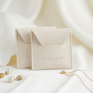 ivory color buckle pouch for earring and ring