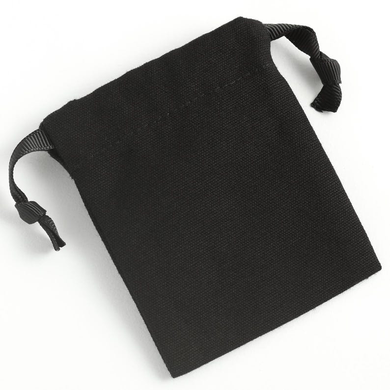 black canvas drawstring bag