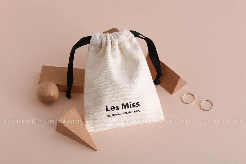 beige 12 oz cotton canvas bag with logo and ribbon, products dusty bag