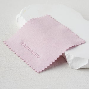 Pink 8x8cm cleaning with coloeless debossed logo