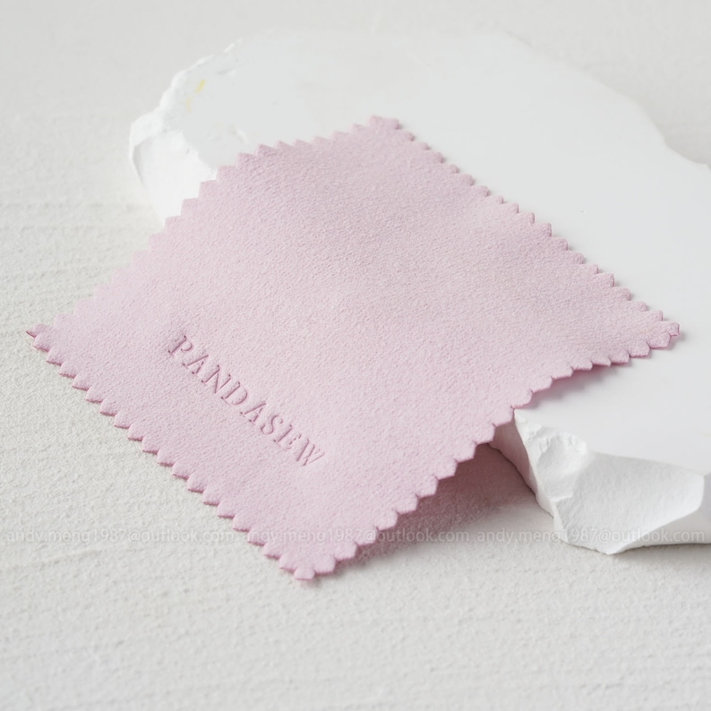 Pink 8x8cm cleaning with colorless debossed logo