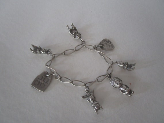 Antique Silver Old Mexican god Charm Bracelet