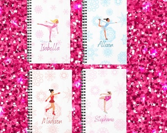 May include: Four white spiral notebooks with a snowflake design and a figure skater on each cover. The names "Isabella", "Allissen", "Madissen", and "Stephanie" are printed on the covers.