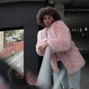 furry pink coat