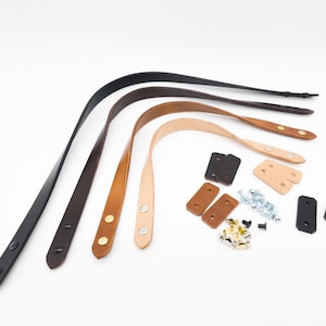 May include: Leather bag straps in various colors: black, dark brown, medium brown, and tan. Includes hardware such as rivets, screws, and connector pieces. Ideal for DIY projects and bag making.
