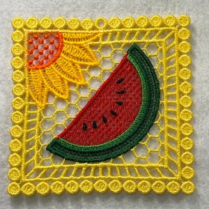May include: A yellow embroidered square with a sunflower and a watermelon slice. The sunflower is in the upper left corner, and the watermelon is in the lower right. The square has a scalloped edge.