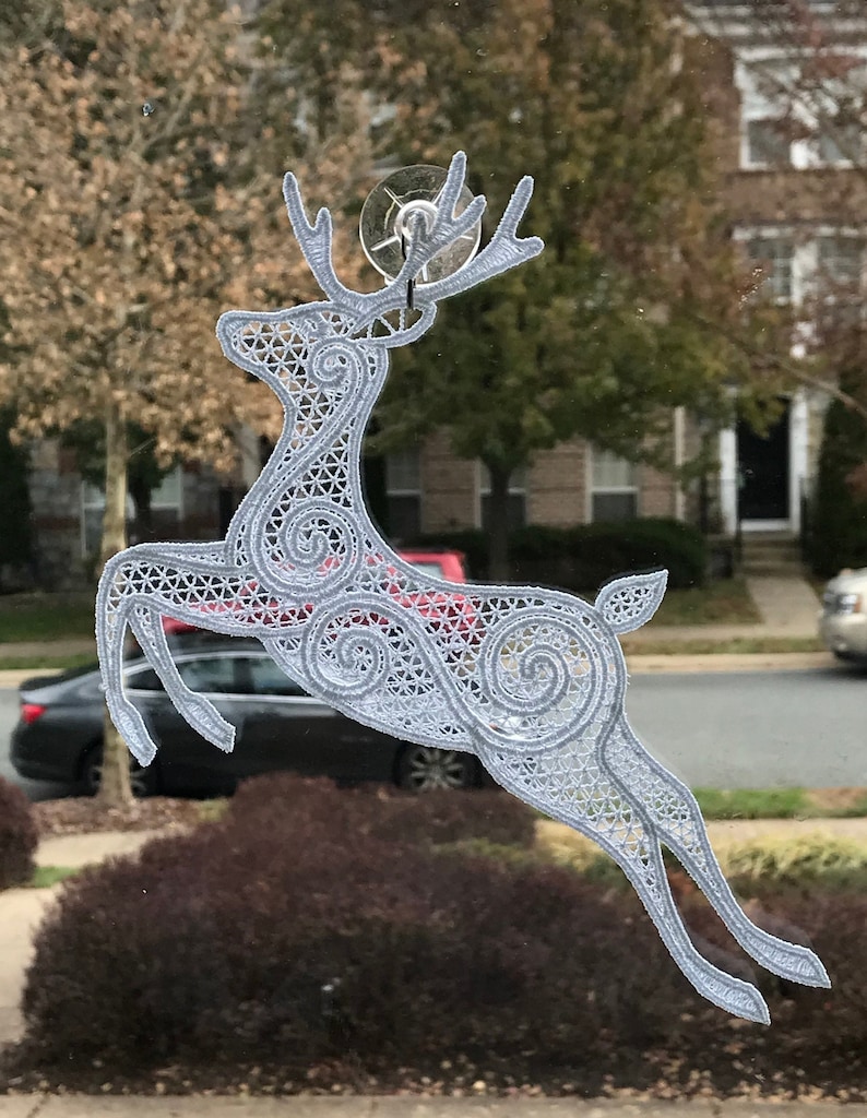Free Standing Lace - A Finished Embroidery product, not a design file or pattern Jumping Reindeer Sun Catcher