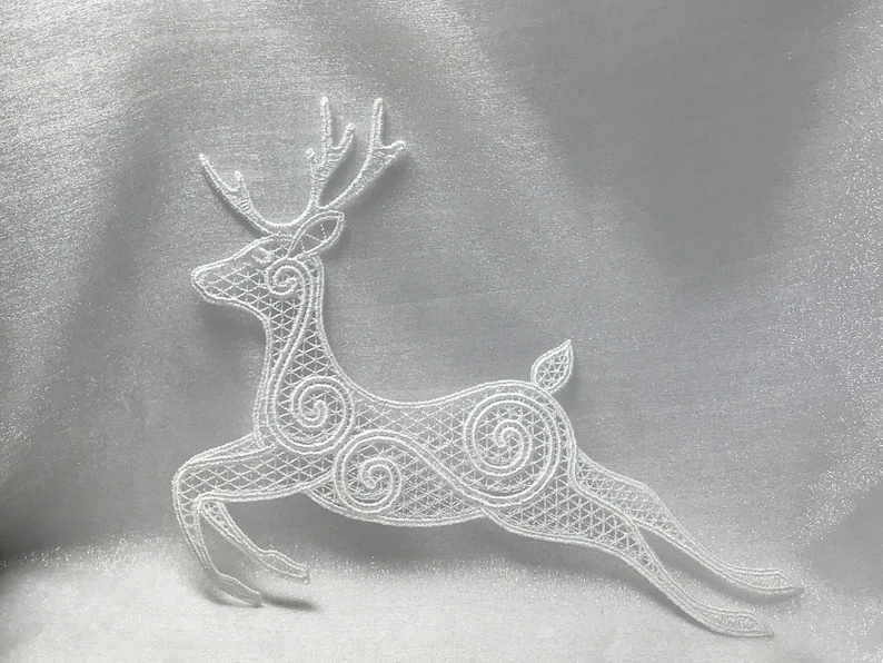 Free Standing Lace - A Finished Embroidery product, not a design file or pattern Jumping Reindeer Sun Catcher
