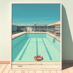 May include: A framed art print featuring a swimming pool scene. The pool is empty, with a red and white life preserver at the bottom. The sky is a clear blue, and the pool area has a retro aesthetic.